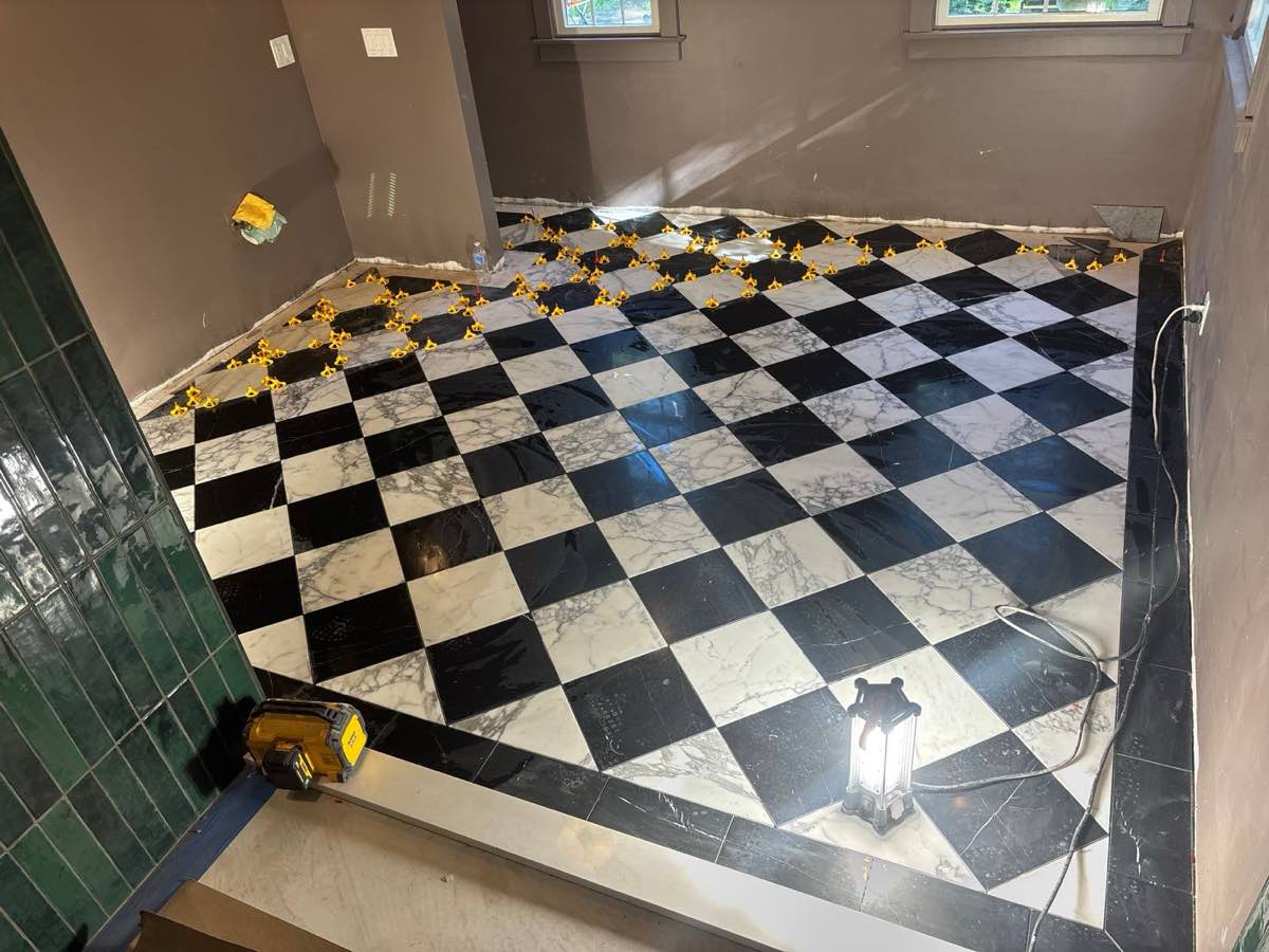 Marble checkerboard floor going down